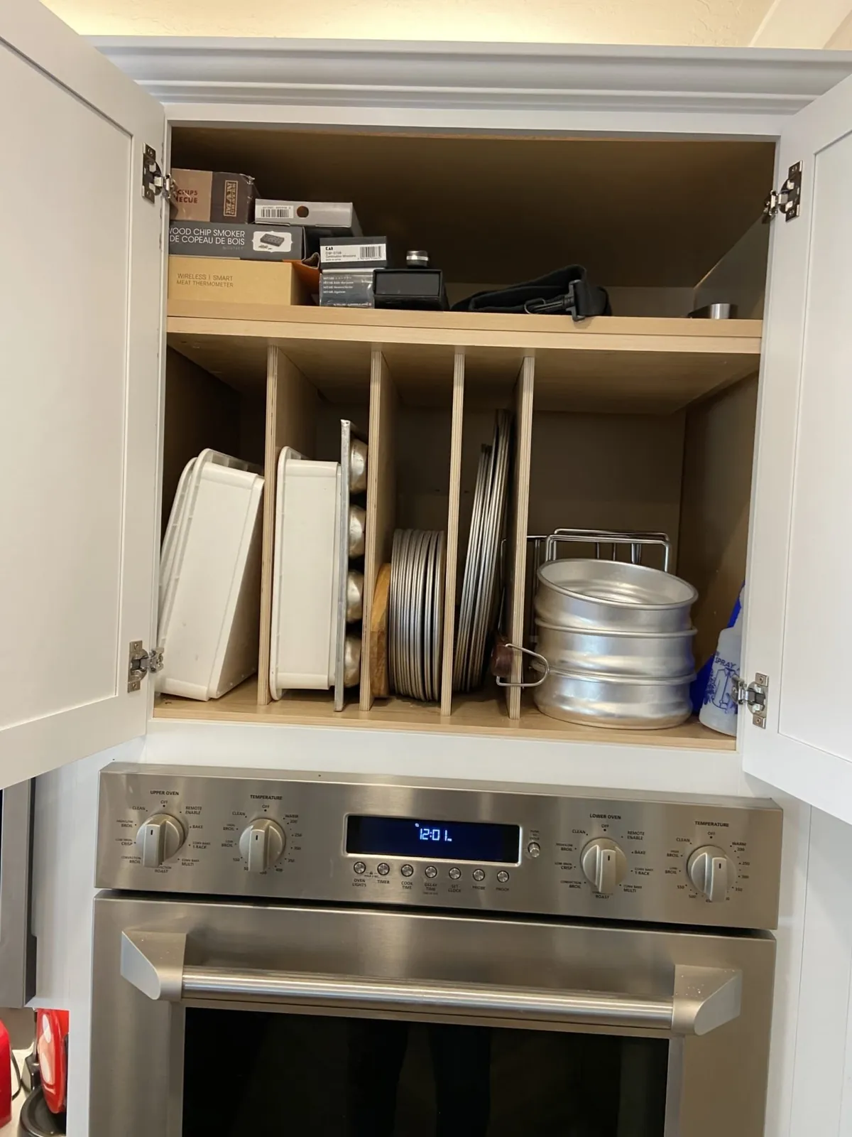 Vertical pan dividers in the cabinet above the wall oven