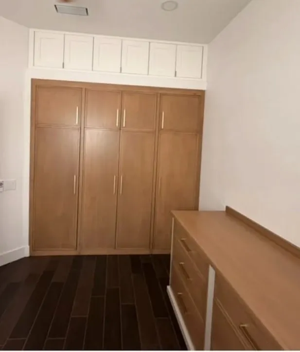 The oak wardrobe wall from the doorway